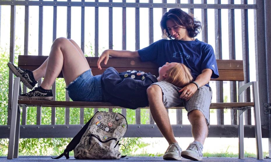 Jonny and Martina (the founders of FOXI) sitting on a bench